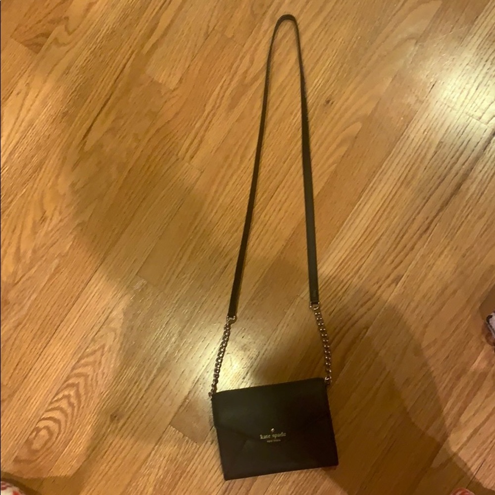 Black and gold Kate Spade cross body bag